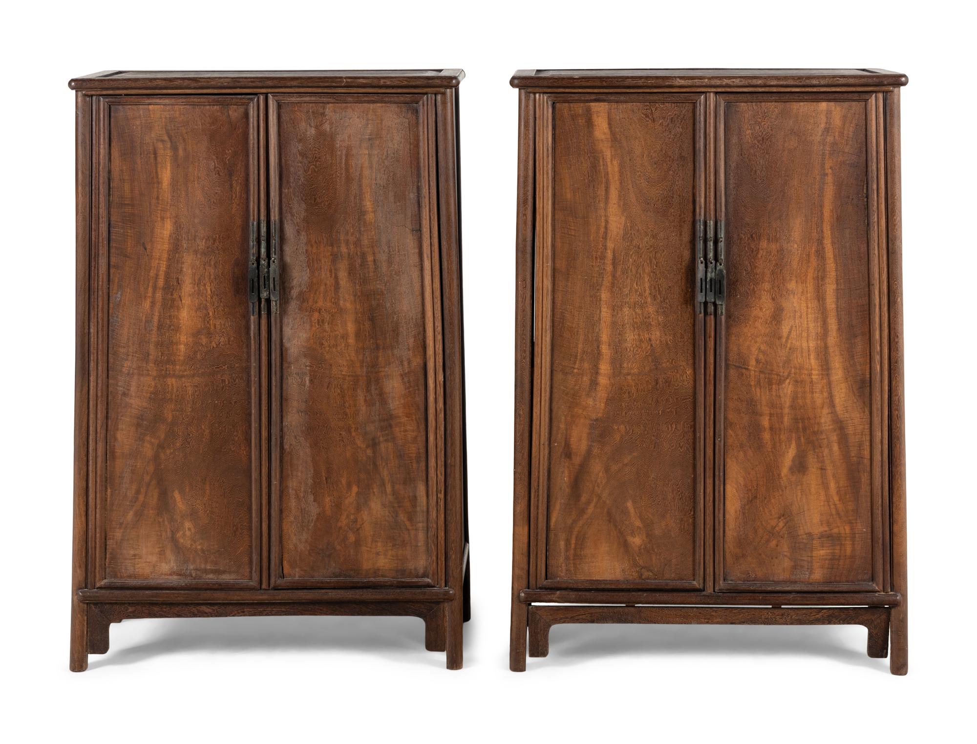 A Pair of Chinese Jichimu Cabinets on Stands