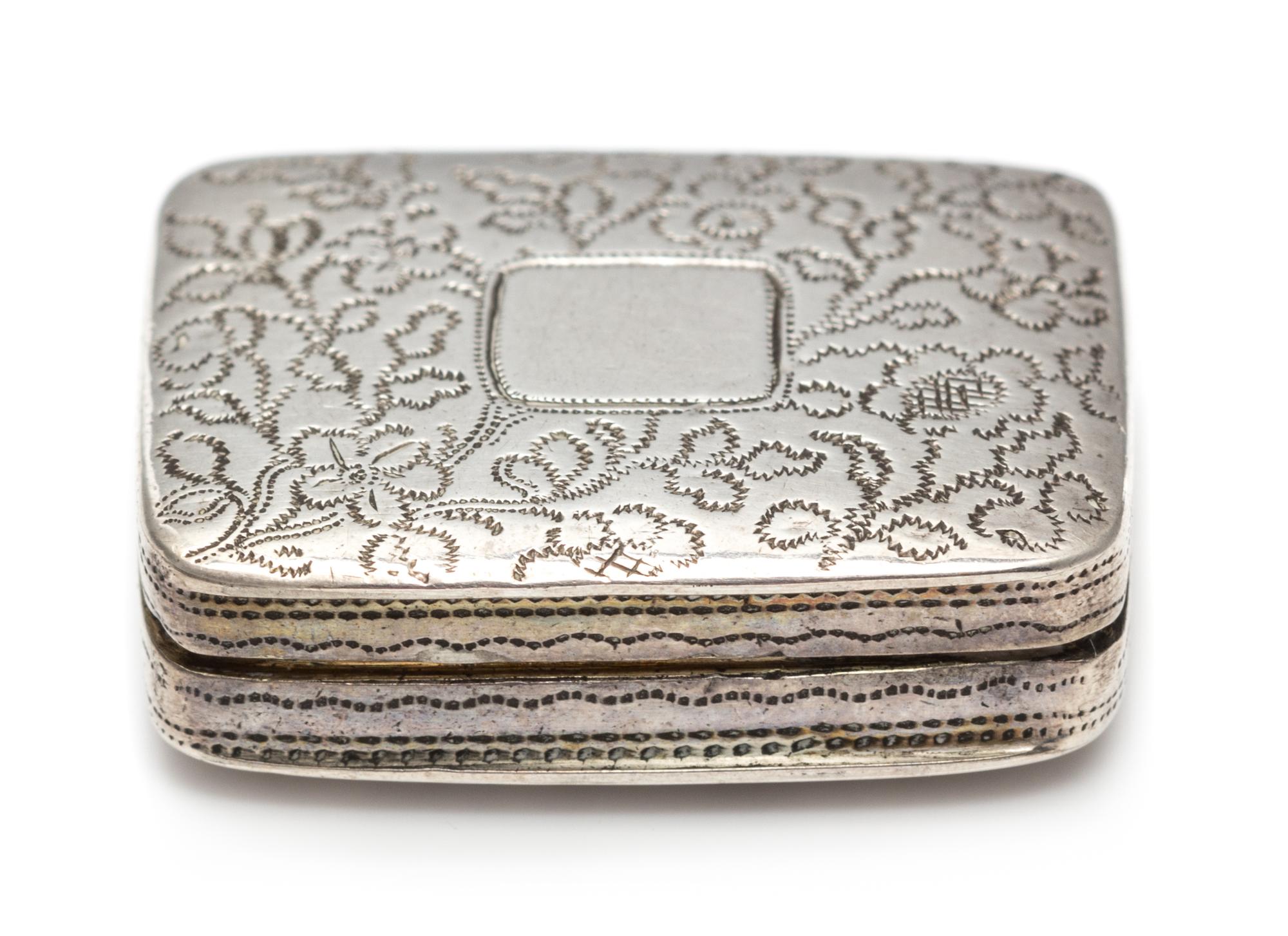 A George III Silver Vinaigrette, William Withers, London, 1778, the case worked with stippled floral and foliate decoration, the lid ce