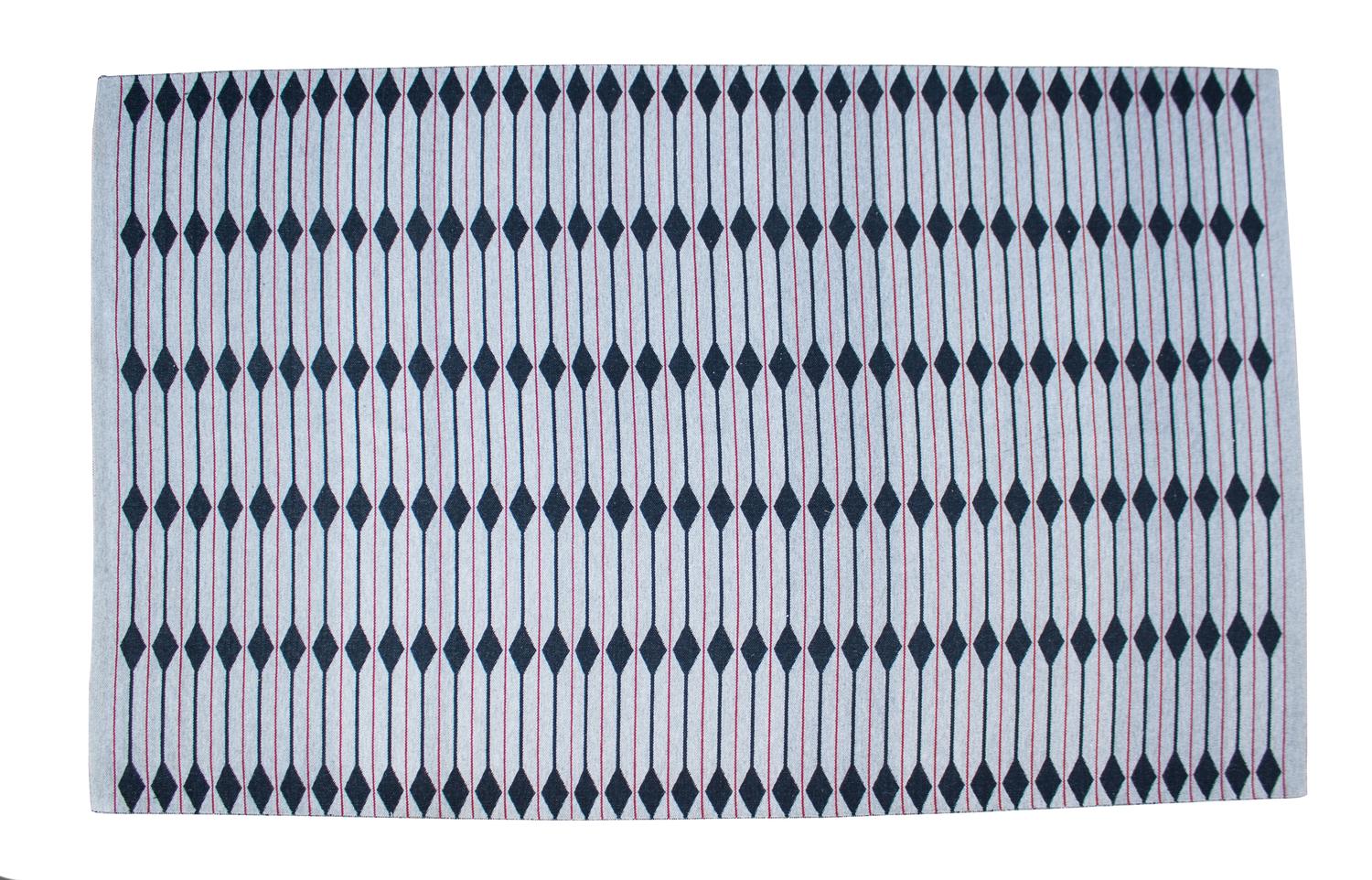 A Contemporary Wool Rug 9 feet 2 inches x 5 feet 9 inches.