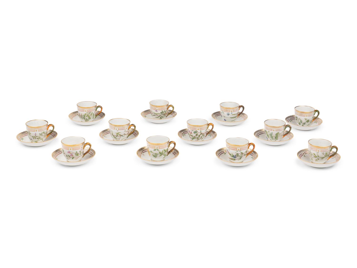 A Set of Twelve Royal Copenhagen Flora Danica Porcelain Teacups and Saucers