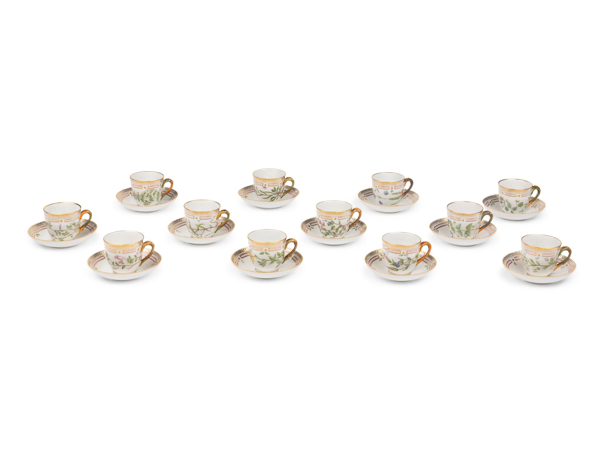 A Set of Twelve Royal Copenhagen Flora Danica Porcelain Teacups and Saucers