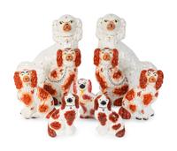 Nine Staffordshire Glazed Earthenware Spaniels — 19TH CENTURY