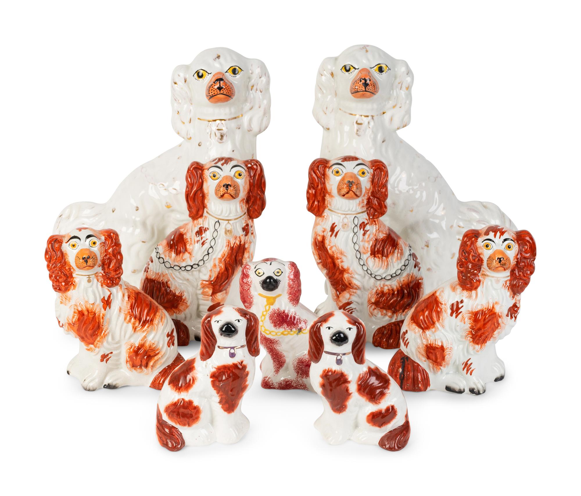 Nine Staffordshire Glazed Earthenware Spaniels — 19TH CENTURY
