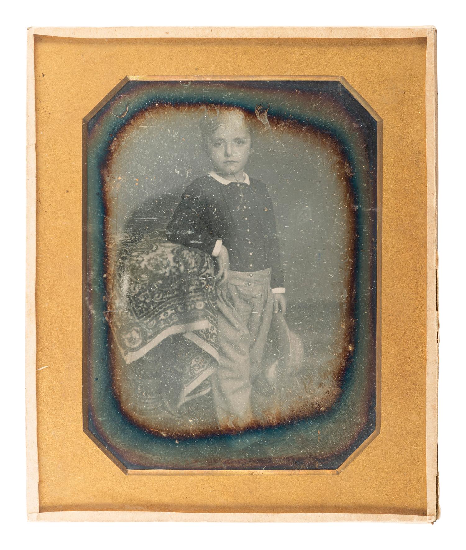 [EARLY PHOTOGRAPHY] -- [FRAZER, Persifor]. [ROOT, M. A., photographer]. Two half plate daguerreotype portraits of young Persifor Frazer, highlighted by view of the boy in colonial garb.
