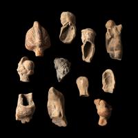 Eleven Hellenistic and Roman Terracotta Figure and Foot Fragments