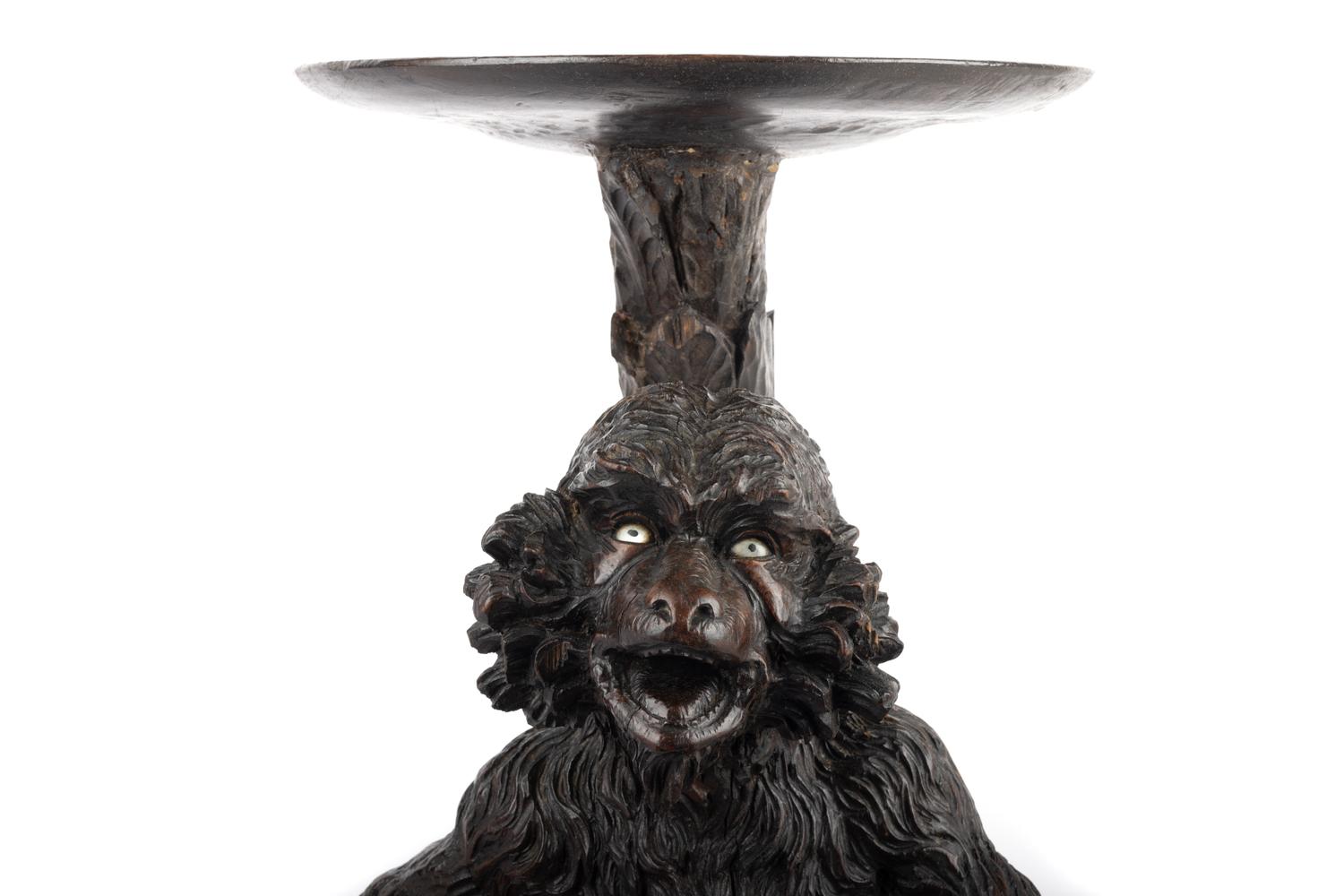 A Venetian Style Carved Walnut Figural Pedestal