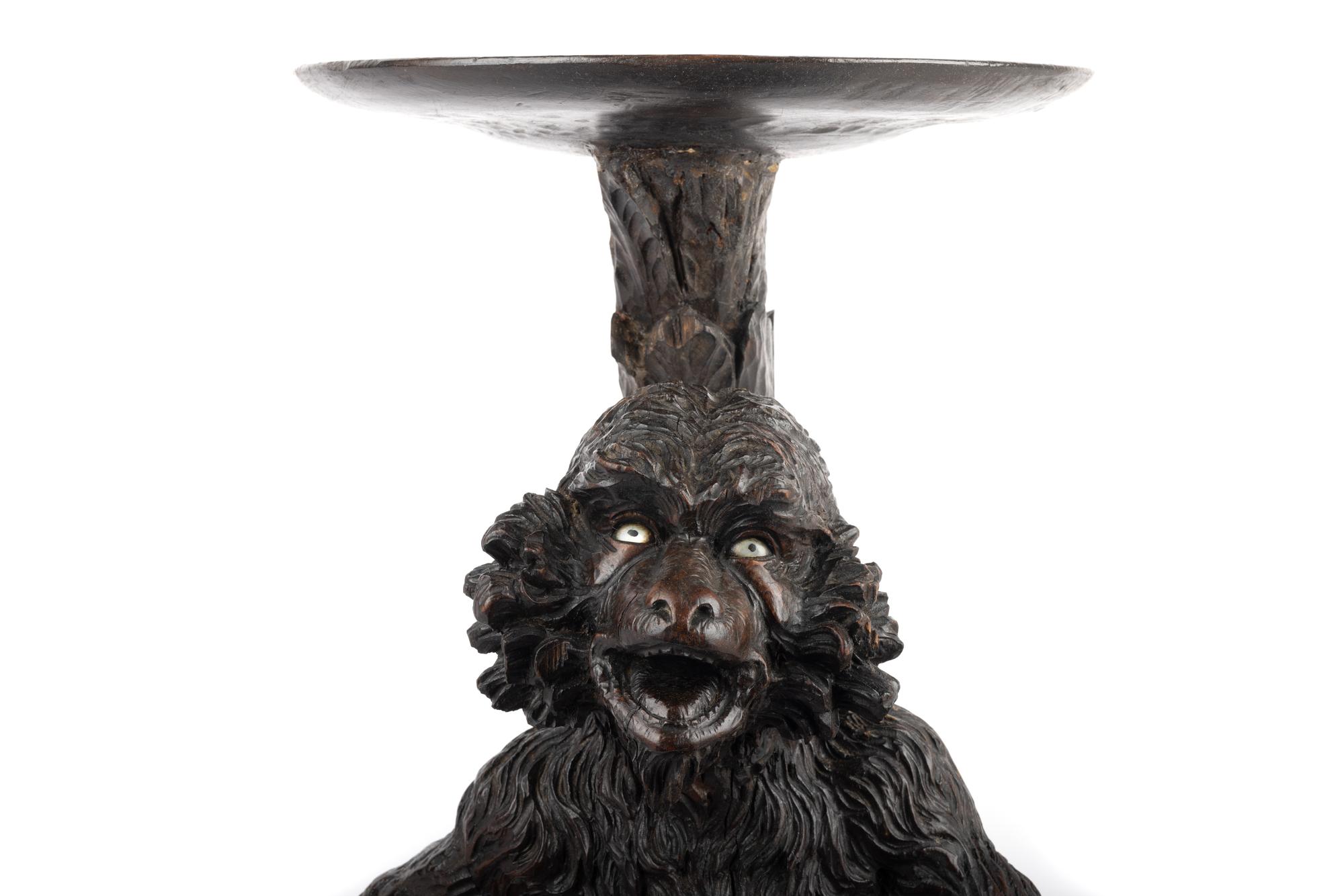A Venetian Style Carved Walnut Figural Pedestal