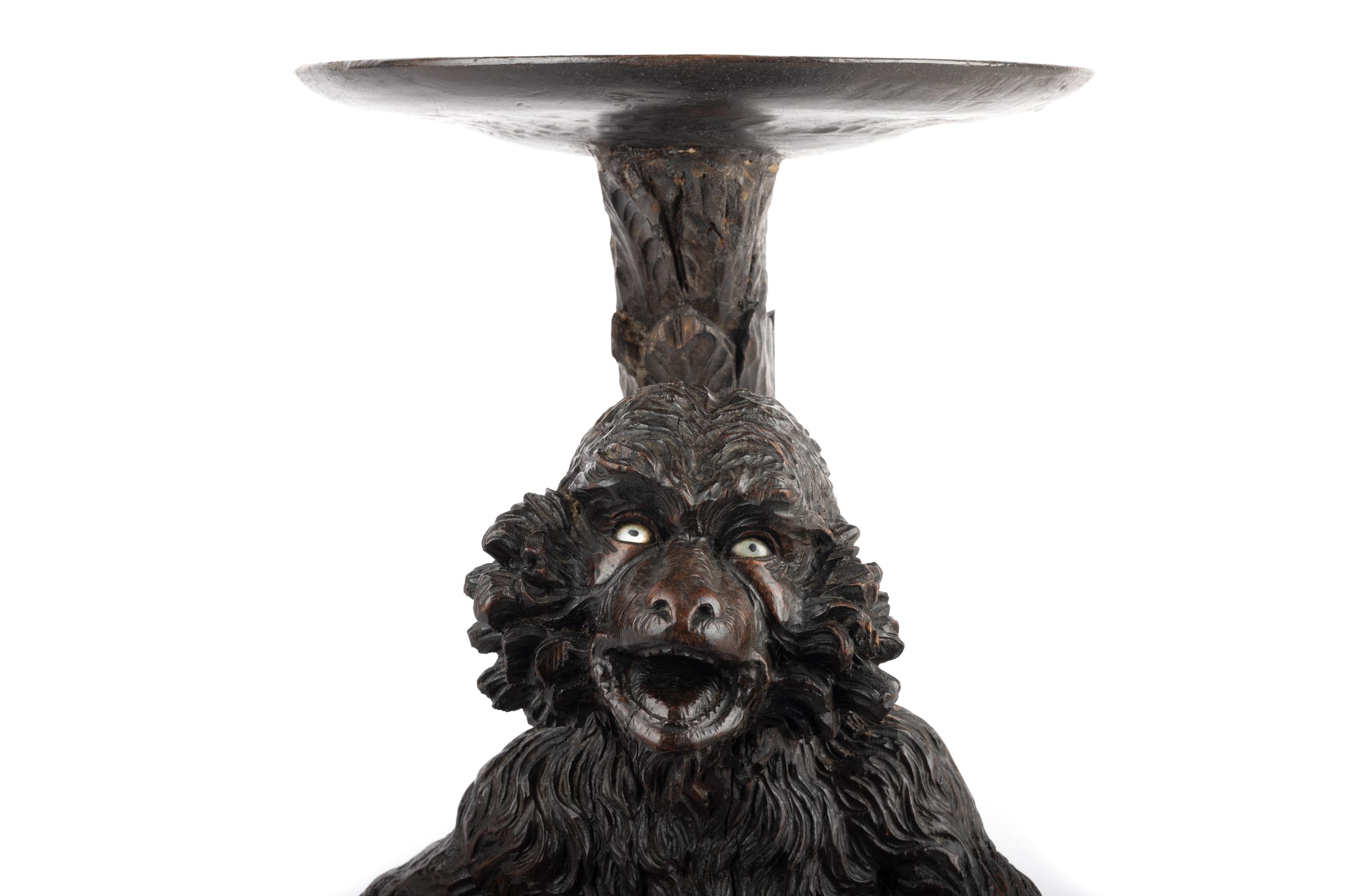 A Venetian Style Carved Walnut Figural Pedestal