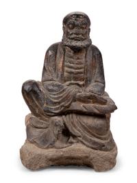 A Chinese Carved Stone Seated Figure