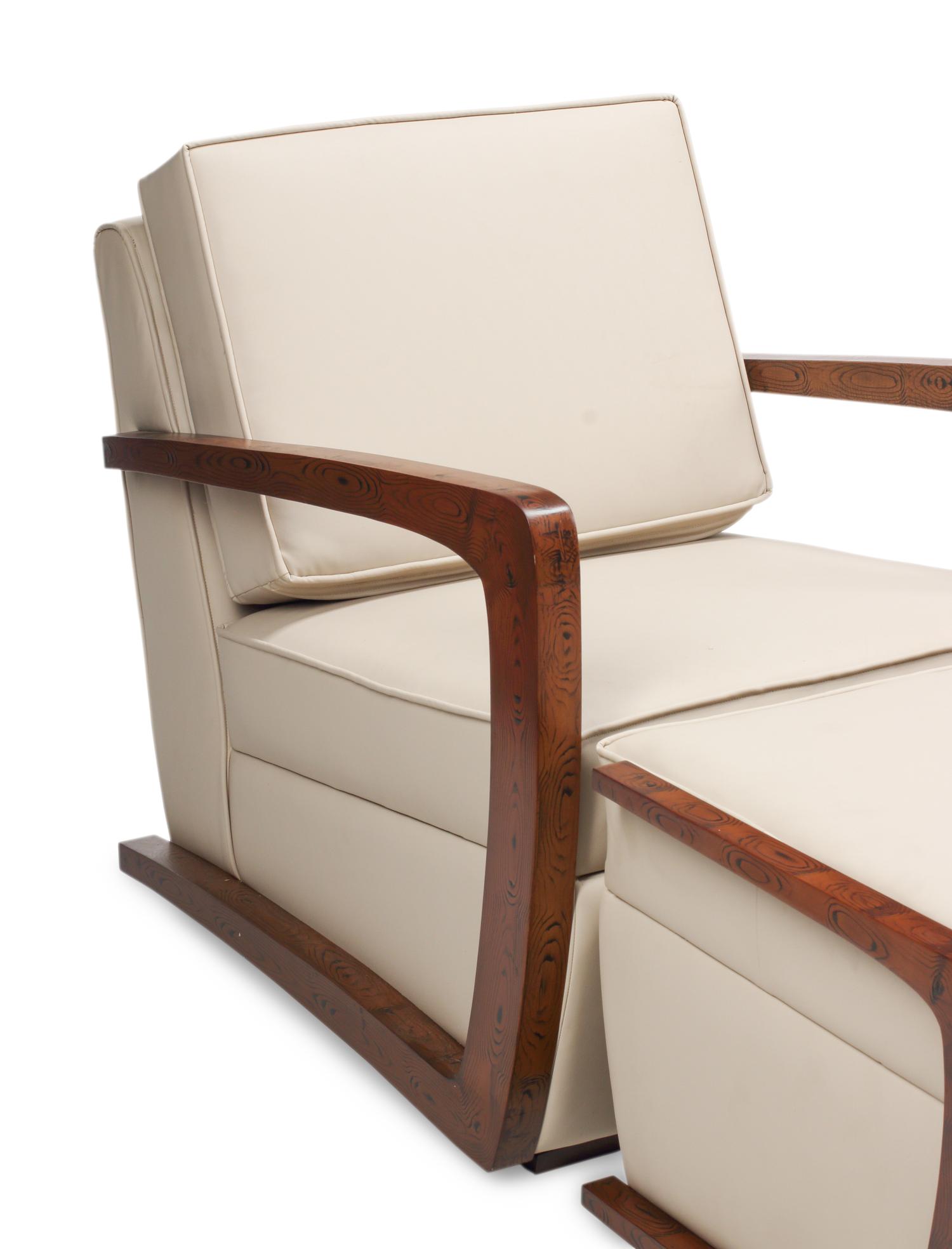 A Pair of Art Deco Style Grain-Painted and Leather Upholstered Armchairs and Ottomans