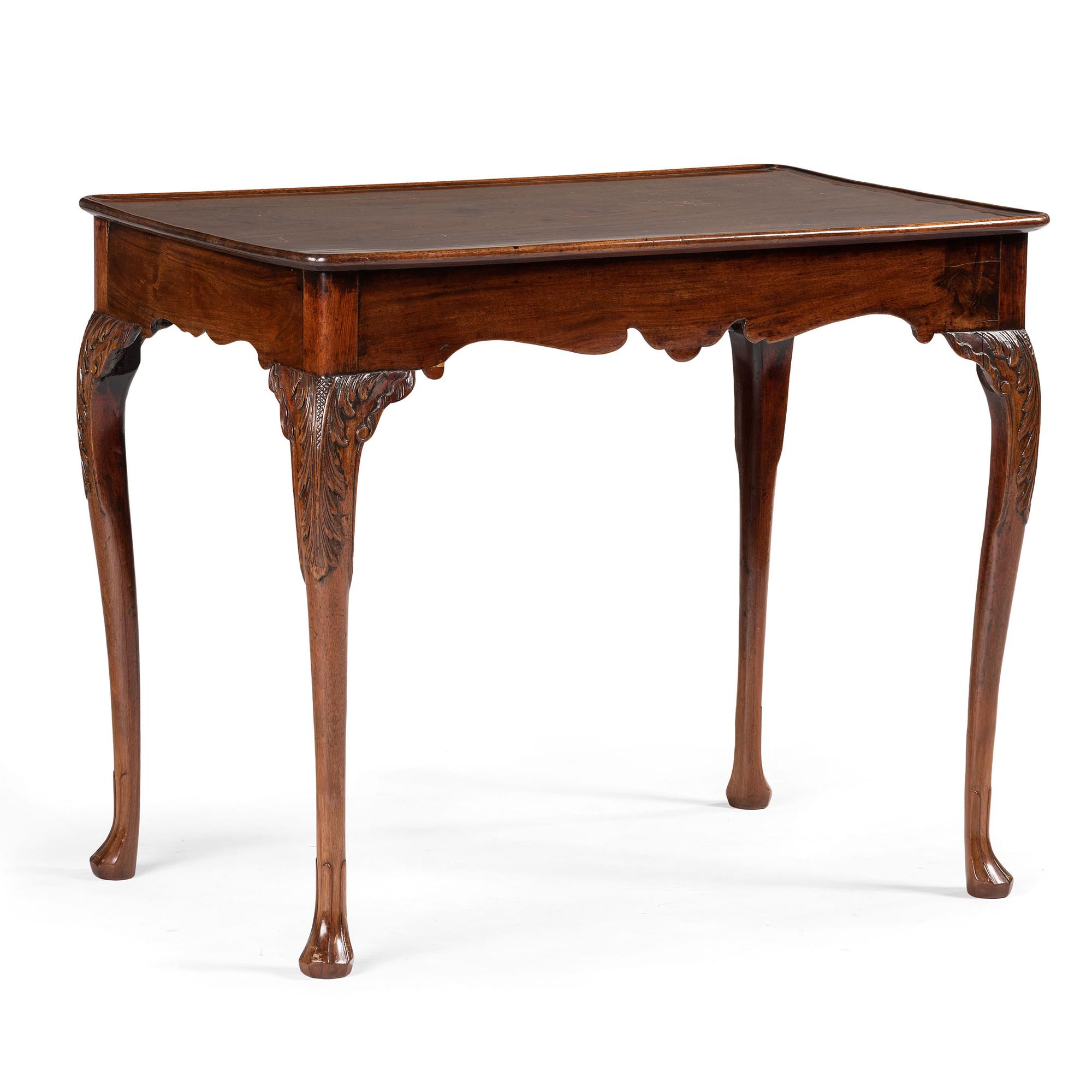 An Irish George III Carved Mahogany Dished Top Tea Table
