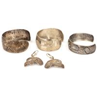 Northwest Coast Etched Figural Silver Cuff Bracelets and Earrings