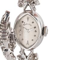 HAMILTON, DIAMOND AND 14K WHITE GOLD SURPRISE WATCH