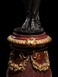 A Pair of Monumental Gilt and Patinated Bronze and Rouge Marble Figural Torchères