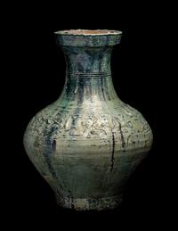 A Chinese Molded Green Glazed Pottery Hu Vase