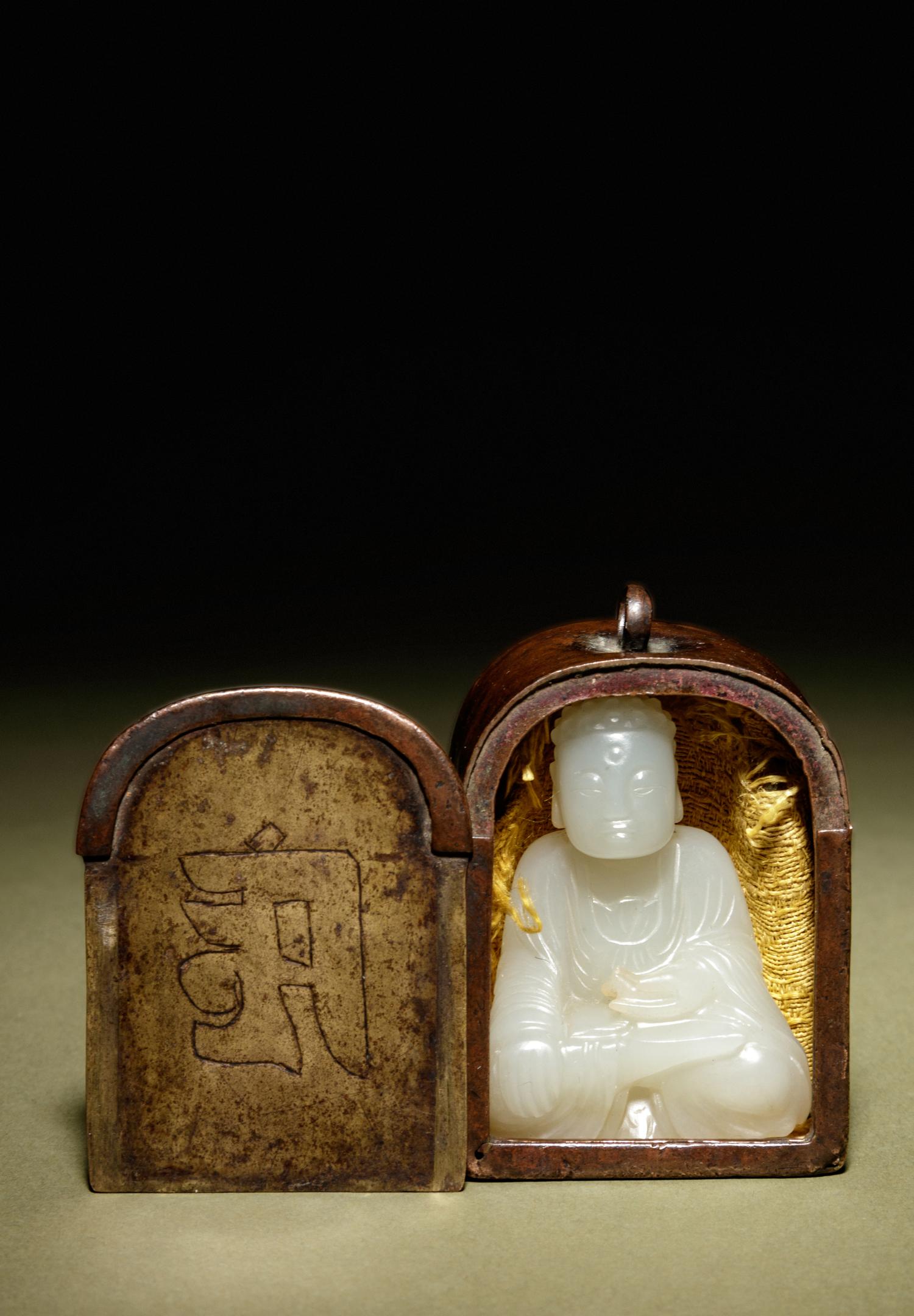 A White Jade Figure of Buddha with a Small Bronze Shrine