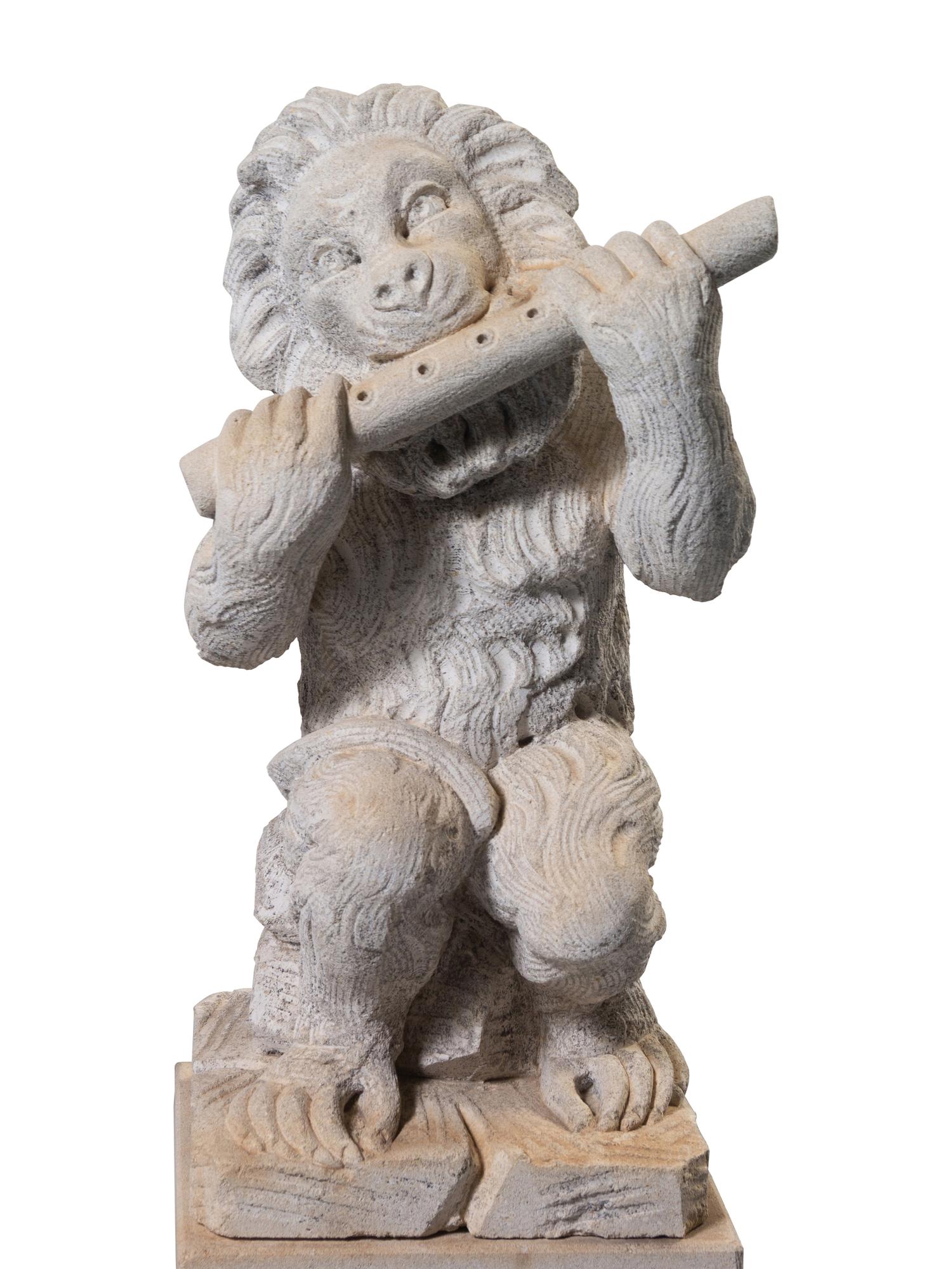 A Set of Four Italian Limestone Figures of Monkey Musicians