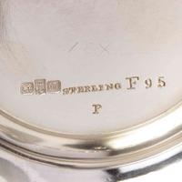 A Japanesque sterling silver coffeepot Gorham Mfg. Co., Providence, RI, bearing date mark for 1883