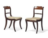 A set of eight Regency brass-inlaid mahogany side chairs, circa 1820