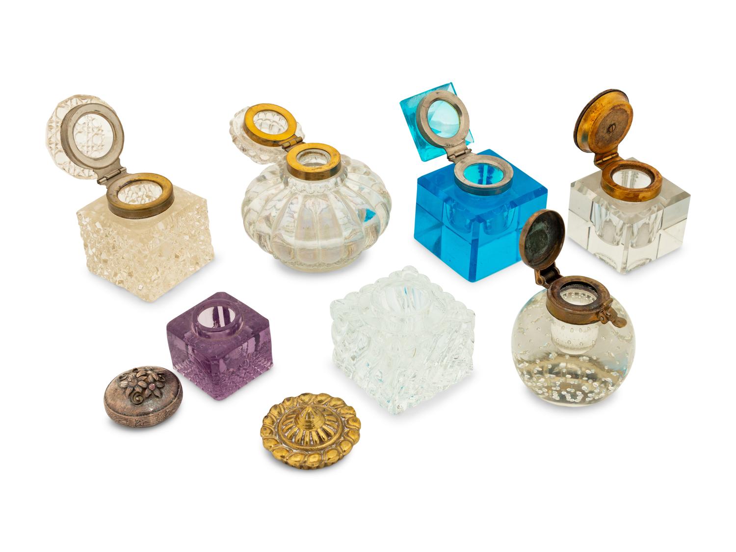 A Group of Brass and Silver Mounted Crystal Inkwells