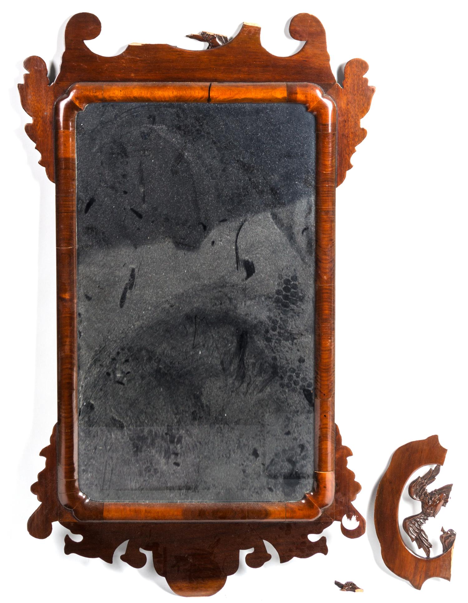 A Carved Wood Mirror Height 37 x width 19 1/2 inches.