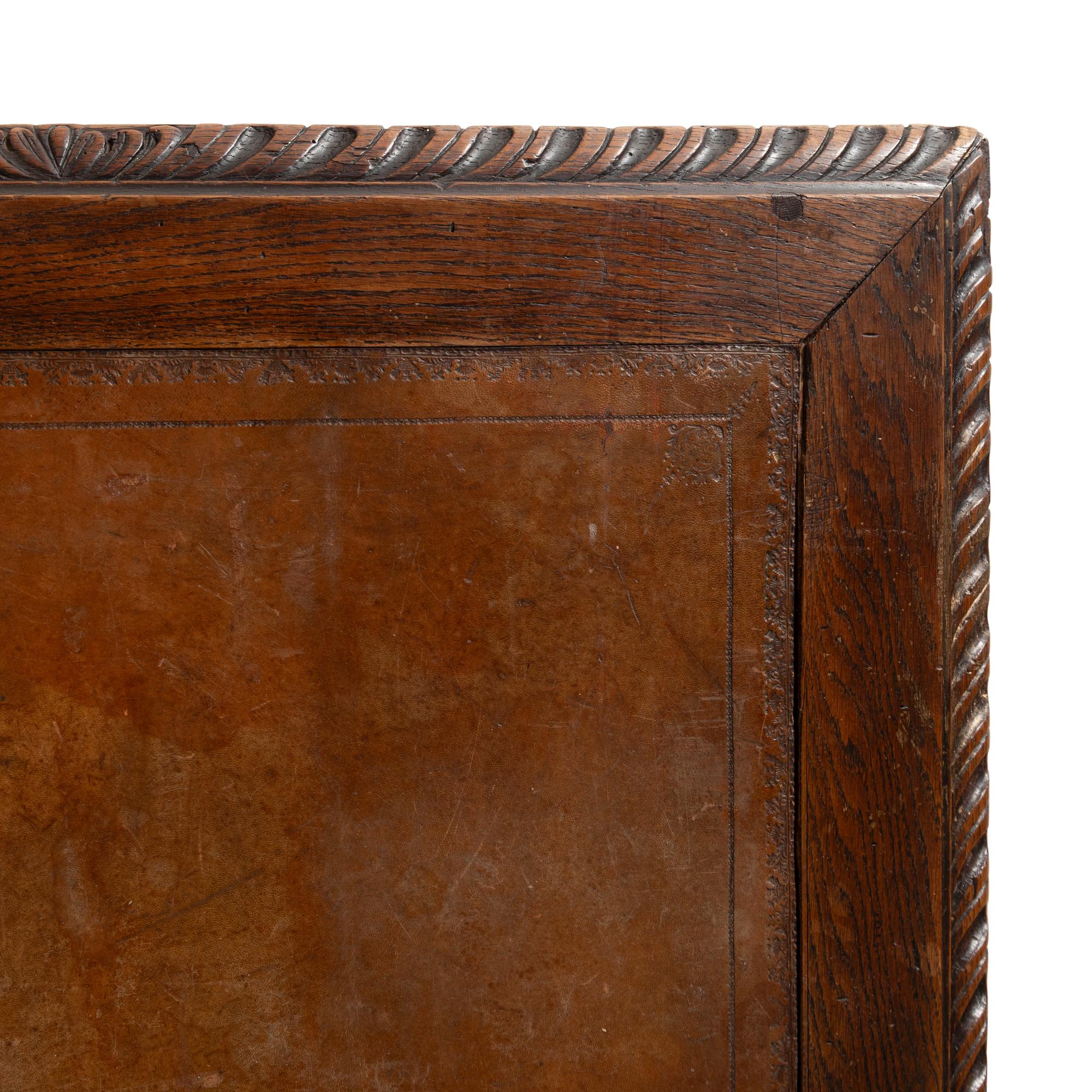 An Italian Carved Oak Writing Table