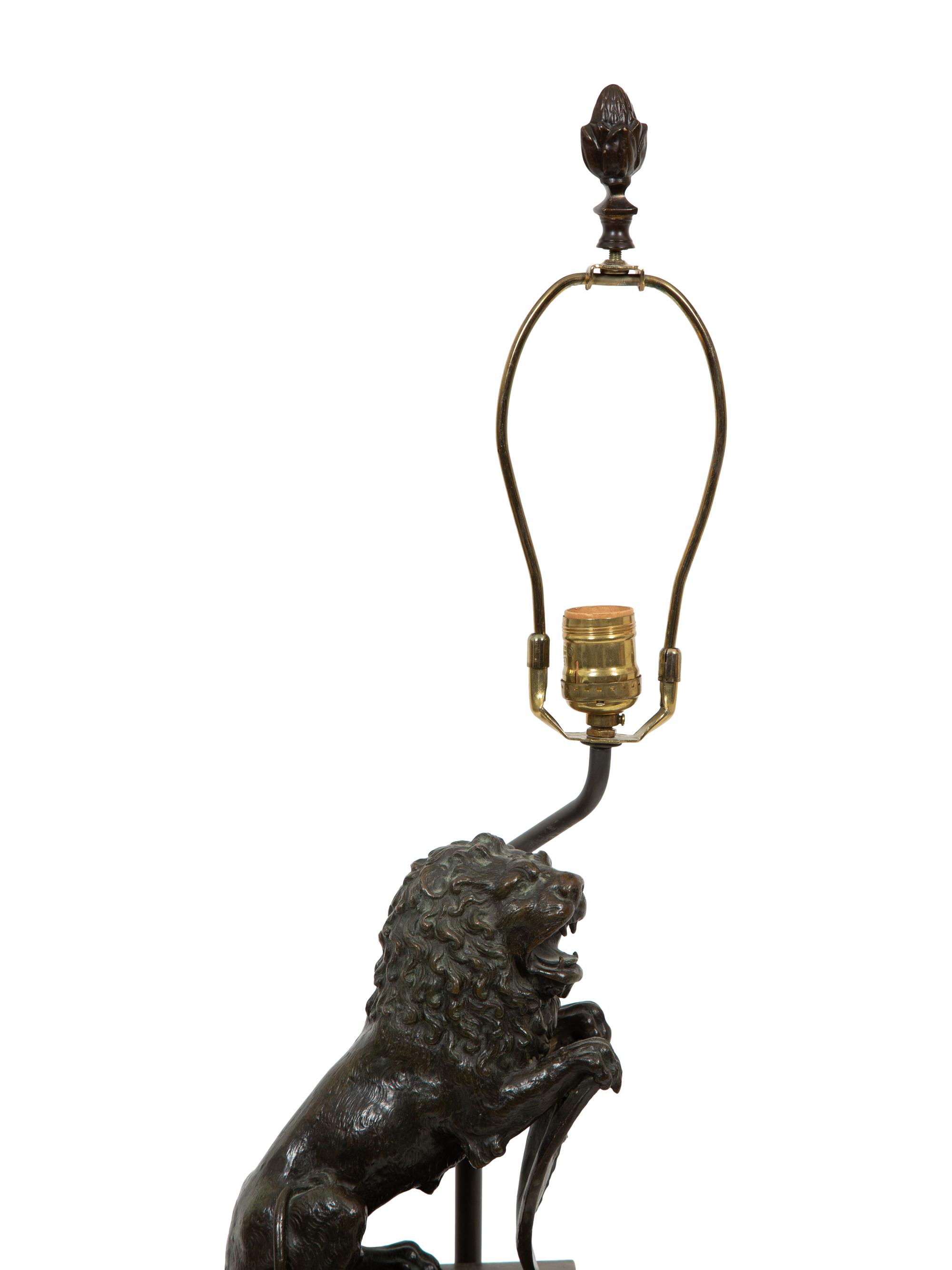 A Continental Bronze Lion and Marble Table Lamp