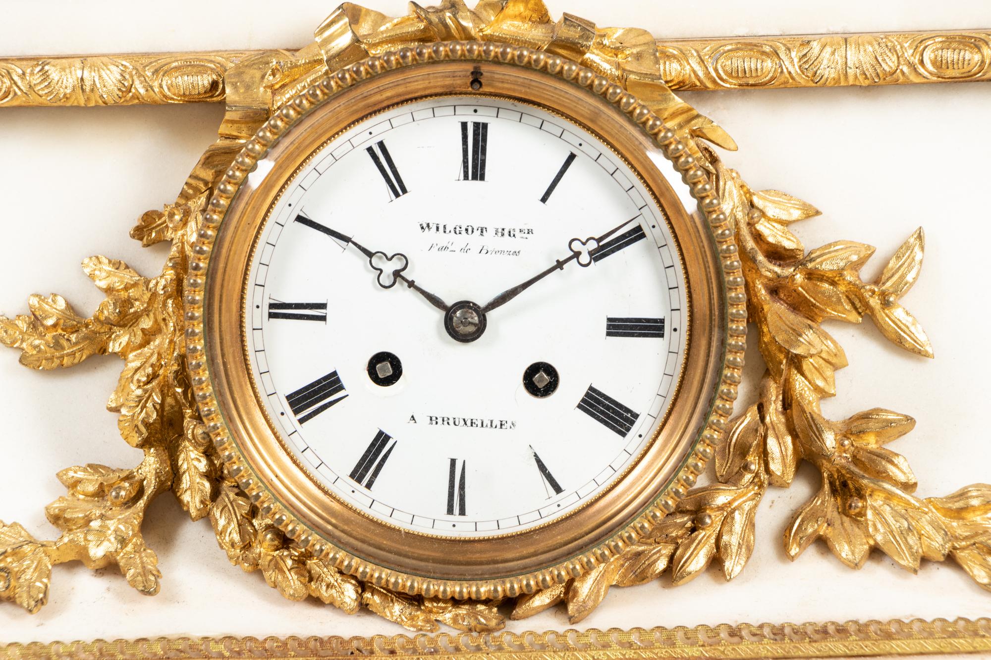 A French Gilt and Patinated Bronze Mounted Marble Mantel Clock