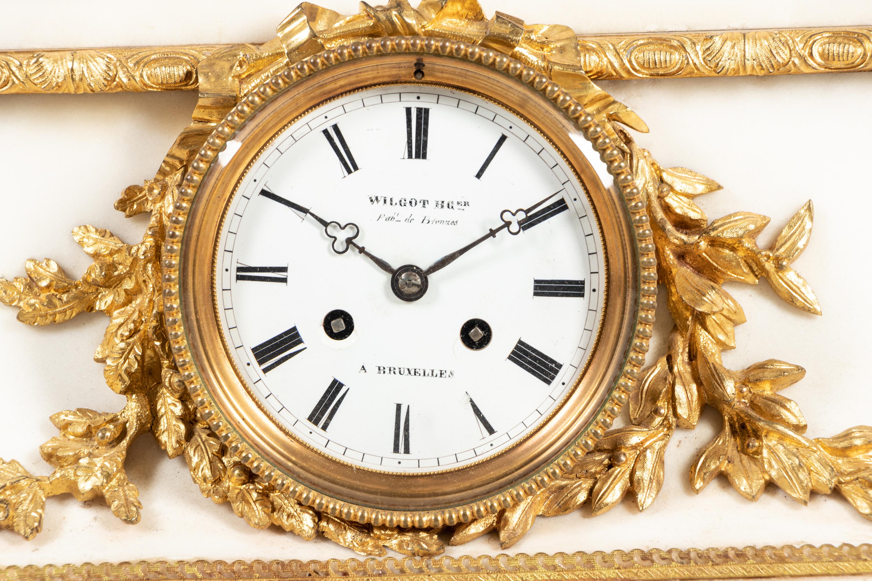 A French Gilt and Patinated Bronze Mounted Marble Mantel Clock