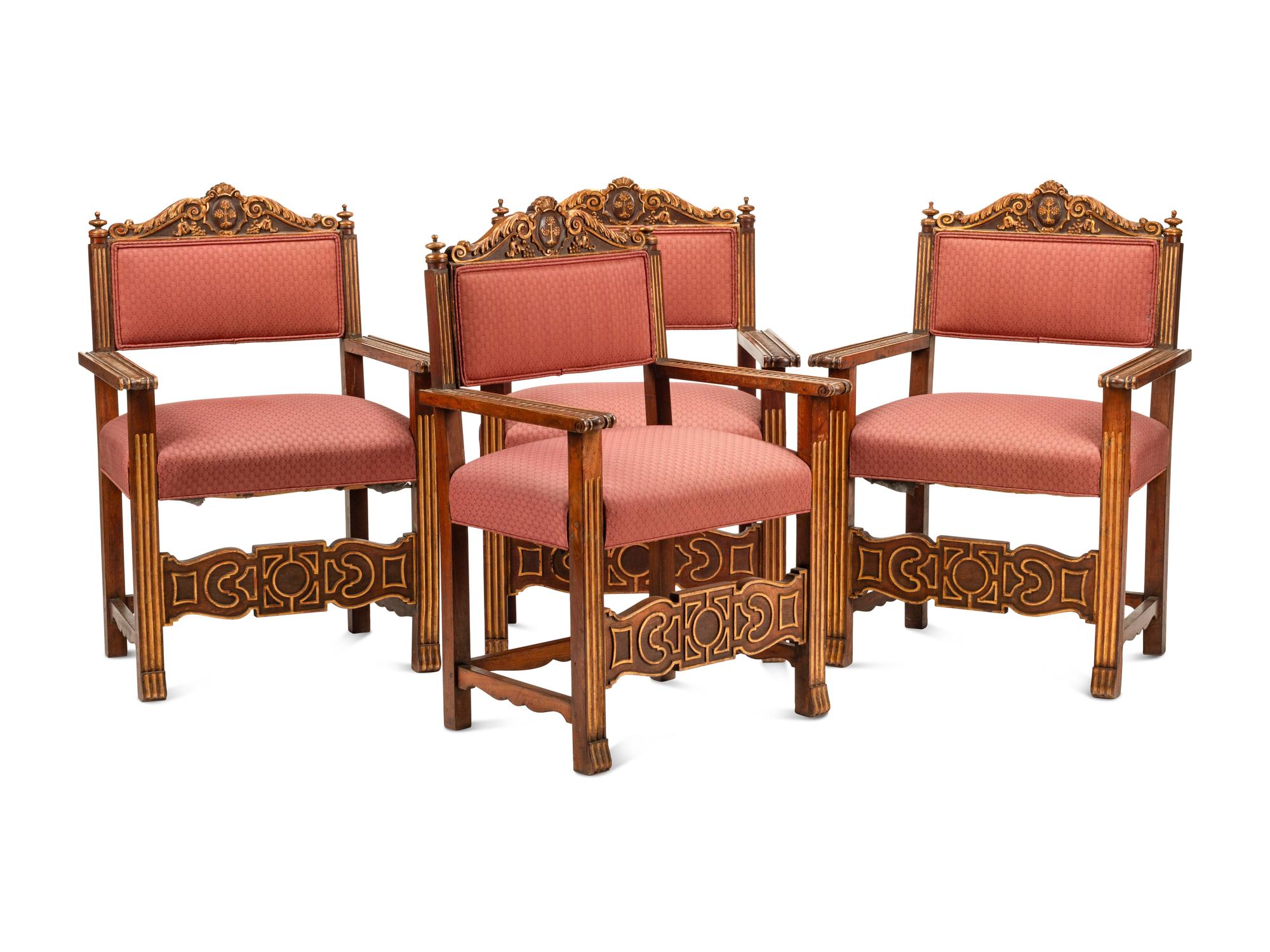A Set of Four Flemish Baroque Revival Parcel Gilt Walnut Armchairs