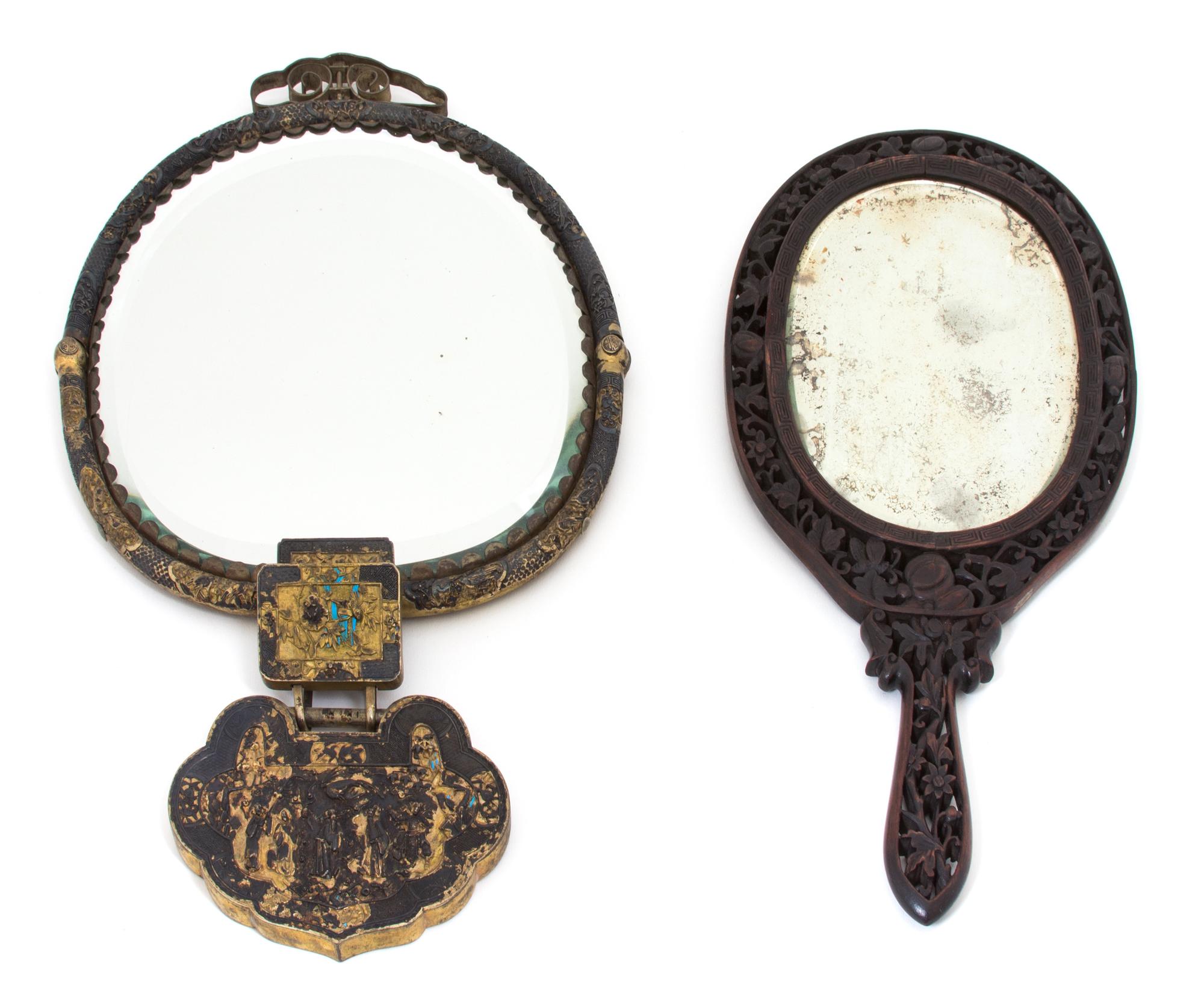 Two Chinese Hand Mirrors Height 14 x width 9 x depth 1 inches.