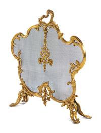 A Louis XV Style Gilt Metal Fireplace Screen