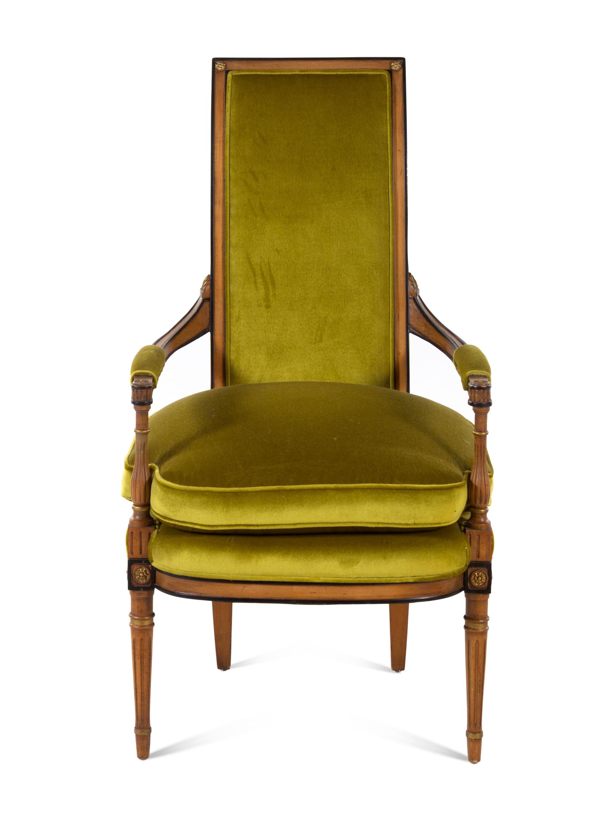 A Louis XVI Style Parcel Ebonized Walnut Fauteuil