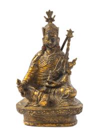 A Tibetan Gilt Bronze Figure of a Deity Height 8 1/2 inches.