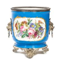 A Silvered Bronze Mounted Sevres Style Porcelain Jardiniere Height 12 x diameter 10 1/2 inches.
