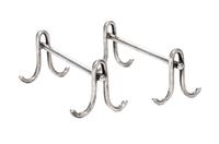 A Pair of American Silver Knife Rests, Gorham Mfg. Co., Providence, RI, each raised on two shaped supports