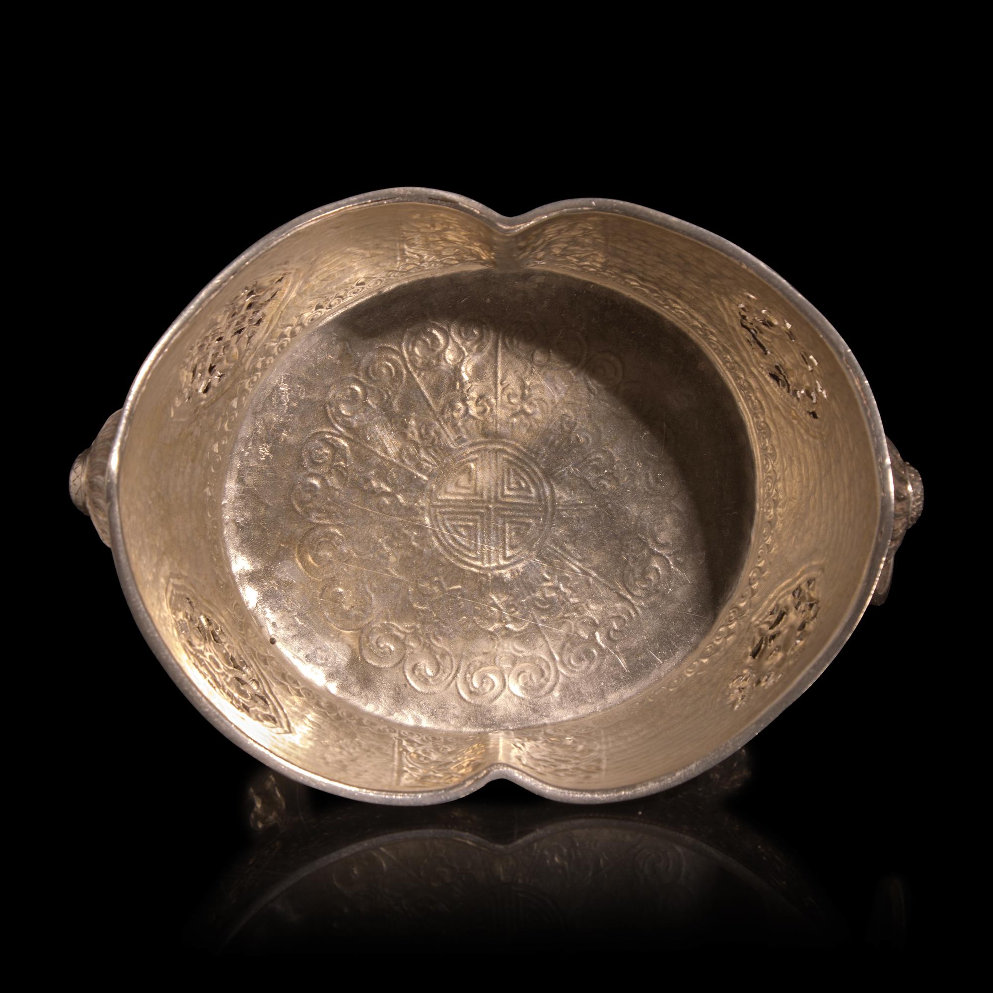 A Chinese or Southeast Asian Silver Alloy Navette-Form Reticulated Footed Bowl — 東南亞銀合金鏨花碗