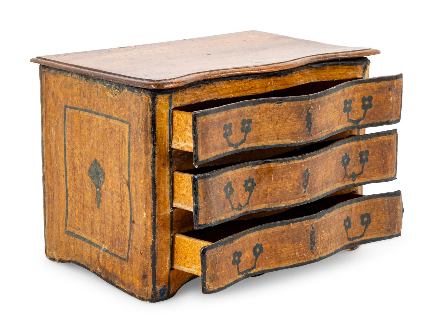 A Papier-Mâché Diminutive Chest of Drawers