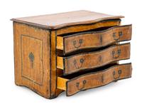 A Papier-Mâché Diminutive Chest of Drawers