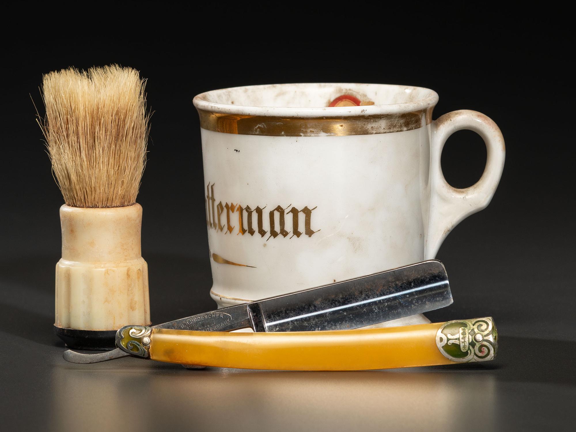 A Velvet-Covered Cased Shaving Compendium