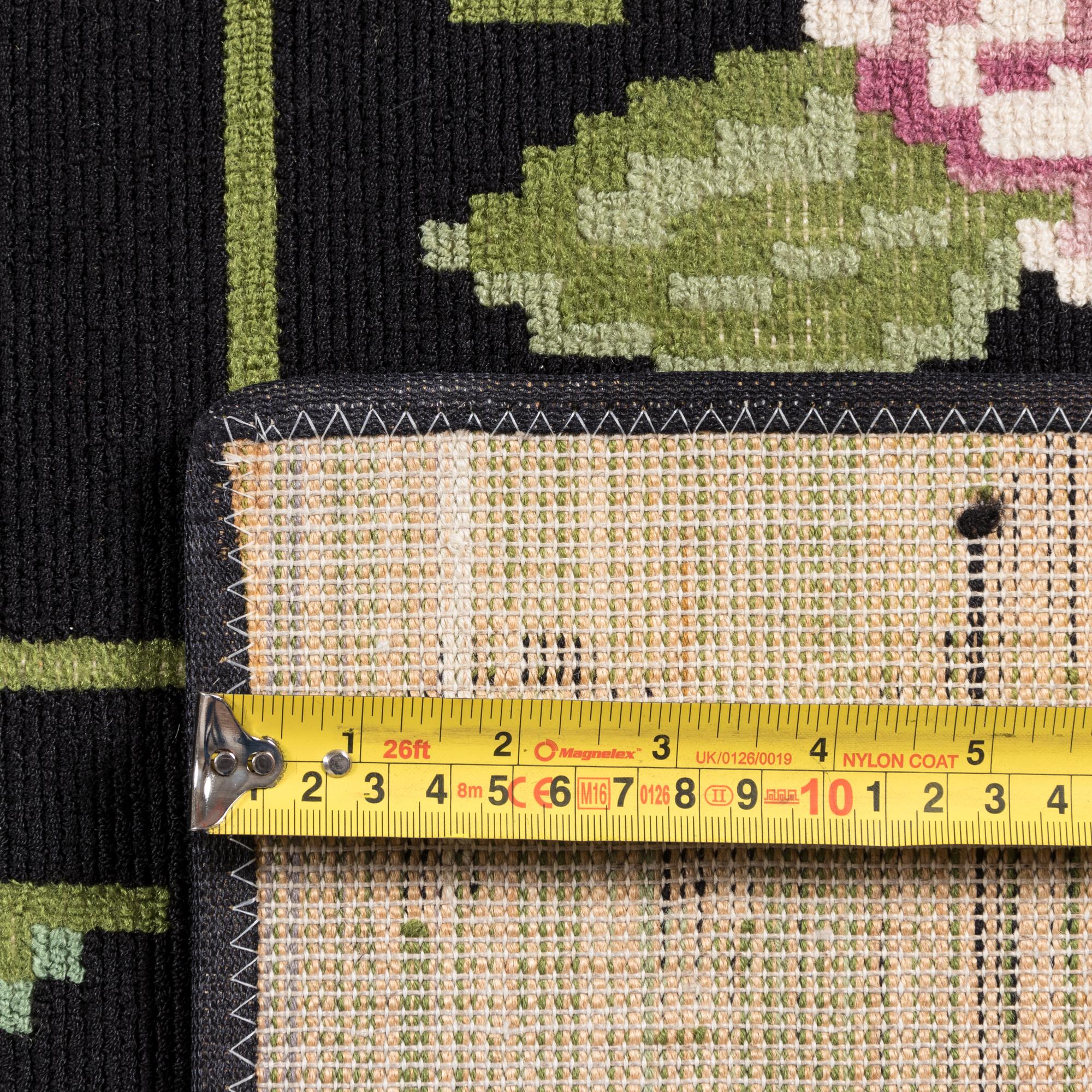 A Stark Faux Needlepoint Rug