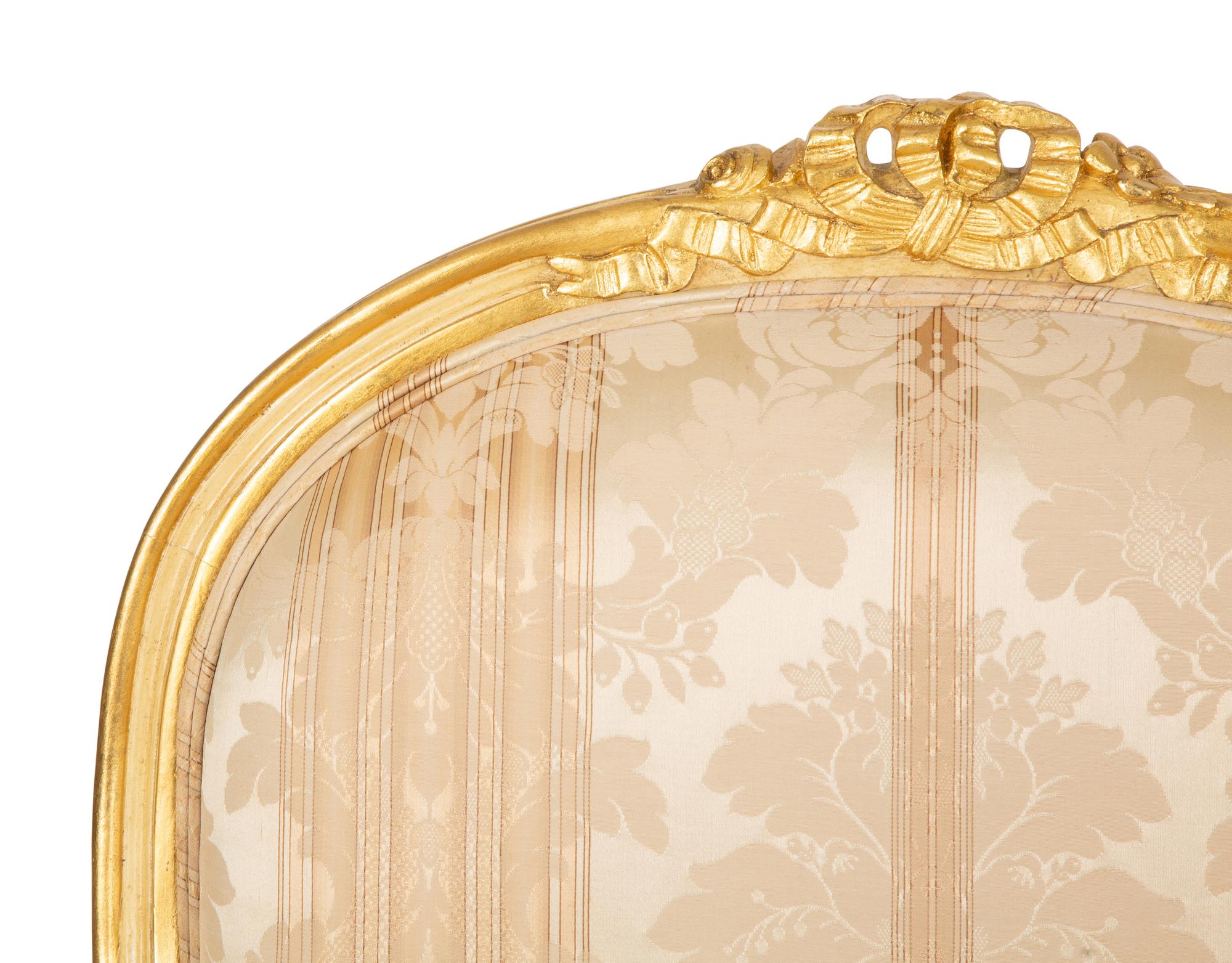 A Pair of Continental Painted and Giltwood Fauteuils