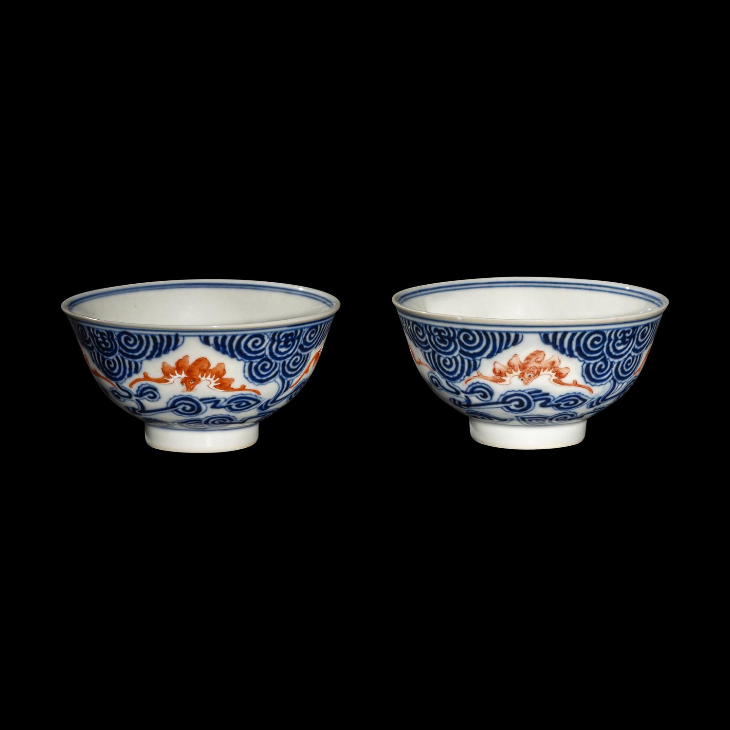 A Pair of Chinese Iron Red and Underglazed Blue 'Bat and Cloud' Bowls, Guangxu Period 清光緒 青花礬紅彩雲蝠紋碗一對