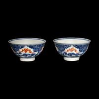 A Pair of Chinese Iron Red and Underglazed Blue 'Bat and Cloud' Bowls, Guangxu Period 清光緒 青花礬紅彩雲蝠紋碗一對