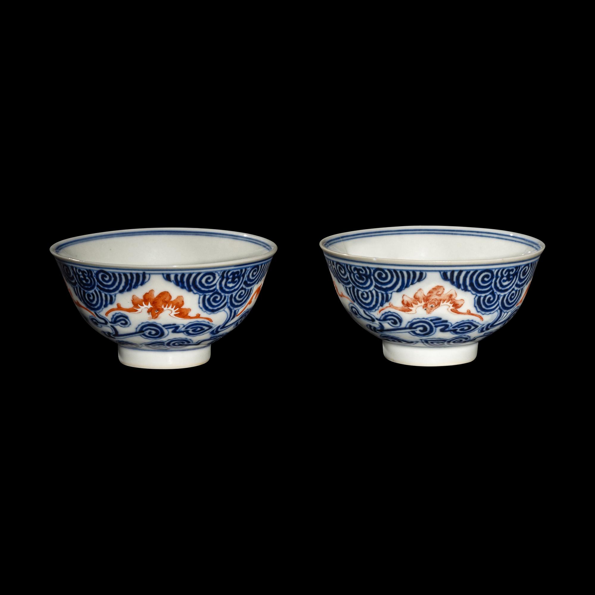 A Pair of Chinese Iron Red and Underglazed Blue 'Bat and Cloud' Bowls, Guangxu Period 清光緒 青花礬紅彩雲蝠紋碗一對