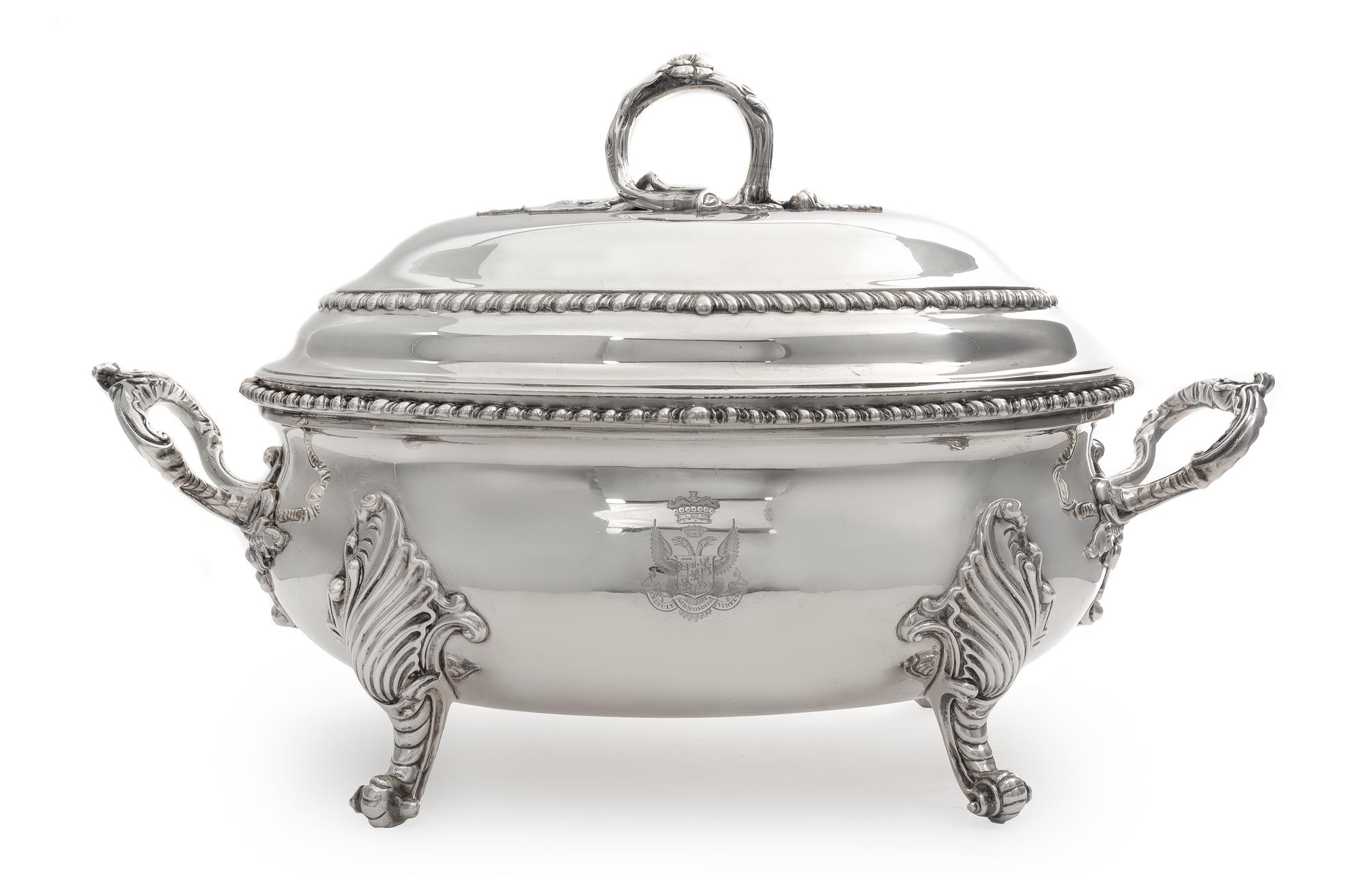 A Victorian Silver Soup Tureen, Robert Garrard II, London, 1846, the cover with an applied vine handle, both cover and body with an eng