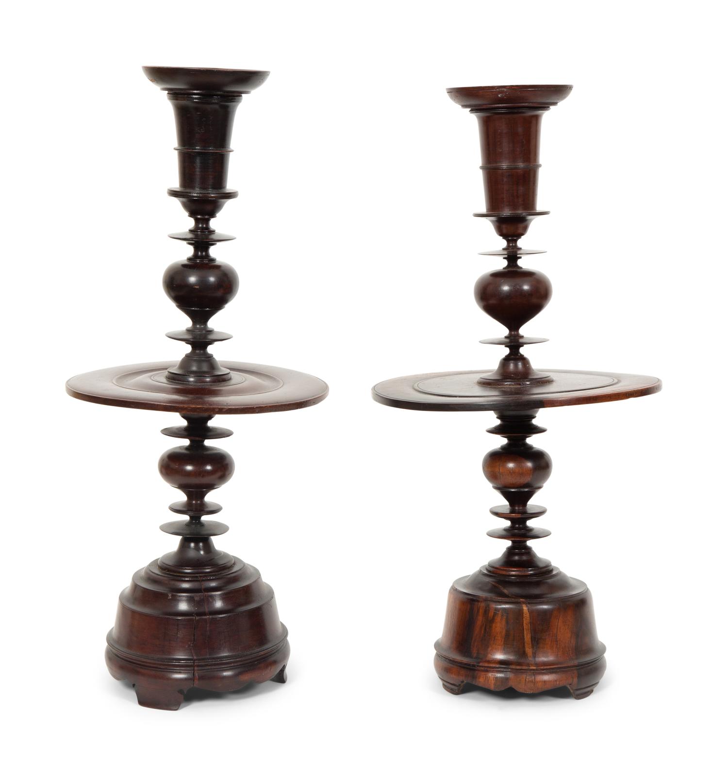 A Pair of Portuguese Colonial Jacaranda Candlesticks