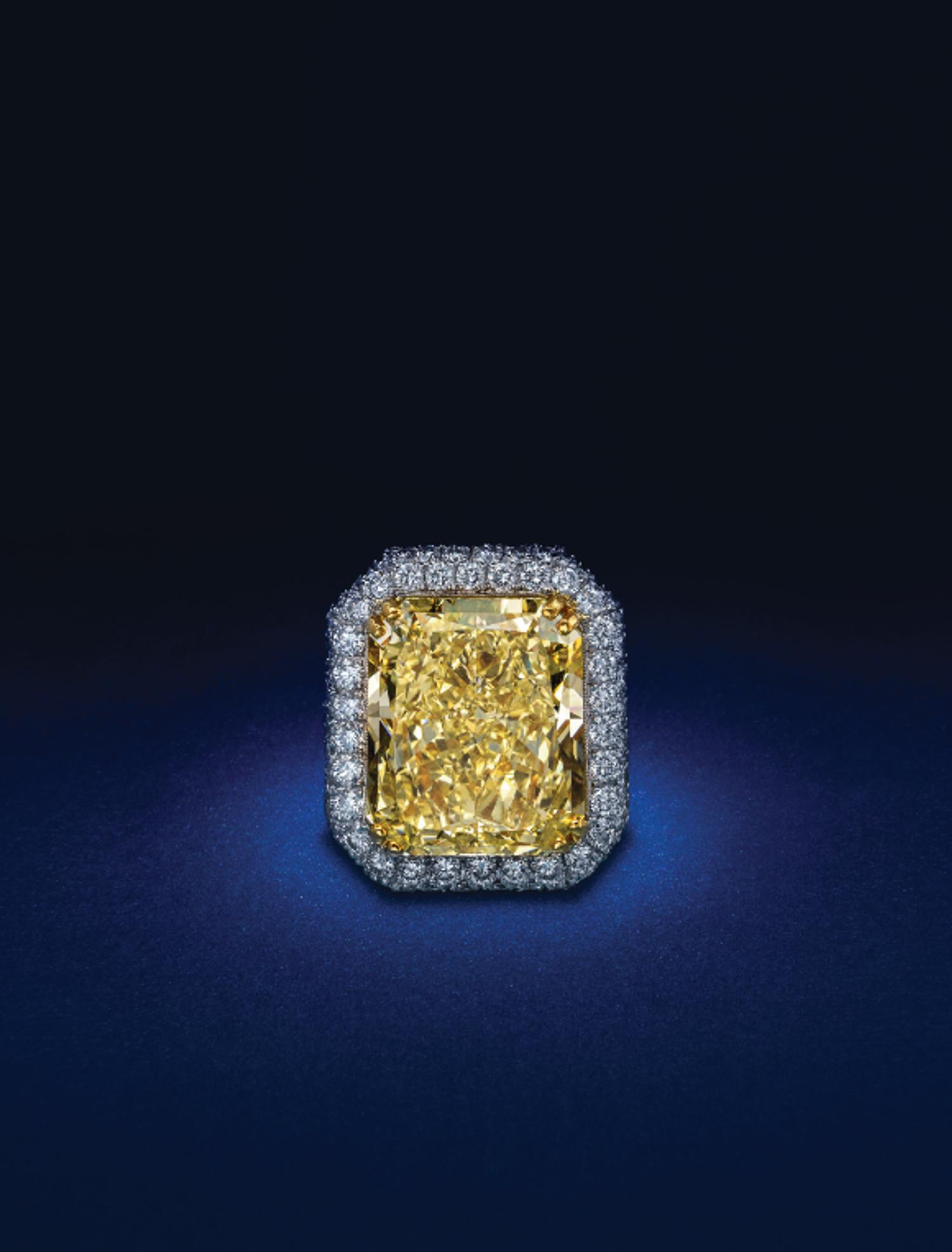 An Exceptional Fancy Yellow Diamond, Platinum and Diamond Ring,