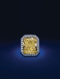 An Exceptional Fancy Yellow Diamond, Platinum and Diamond Ring,