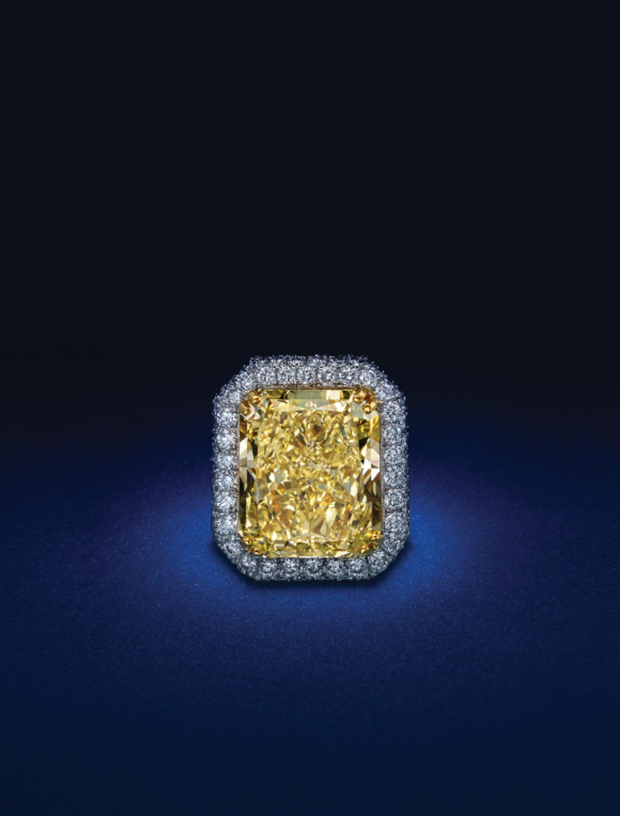 An Exceptional Fancy Yellow Diamond, Platinum and Diamond Ring,